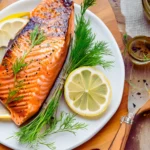 Grilled salmon steak with lemon